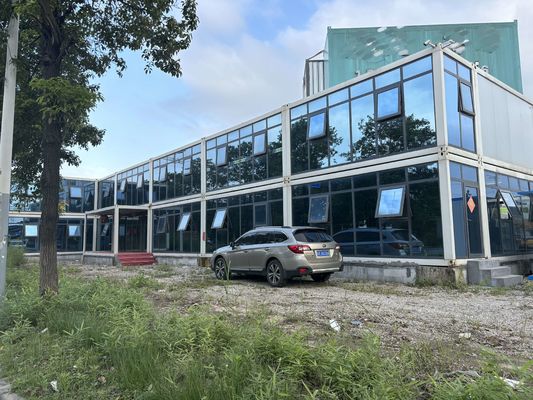 Flexible y conveniente sitio portátil Contenedor de oficina Modular marco de acero de lana de roca panel de sándwich Modular casa