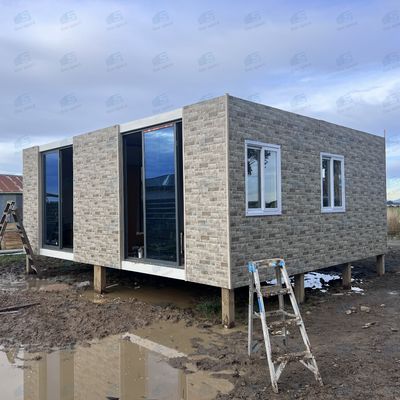 Casas modulares impermeables a los huracanes e impermeables al sonido Edificio de acero Casa de contenedores Casas prefabricadas con revestimiento de metal tallado